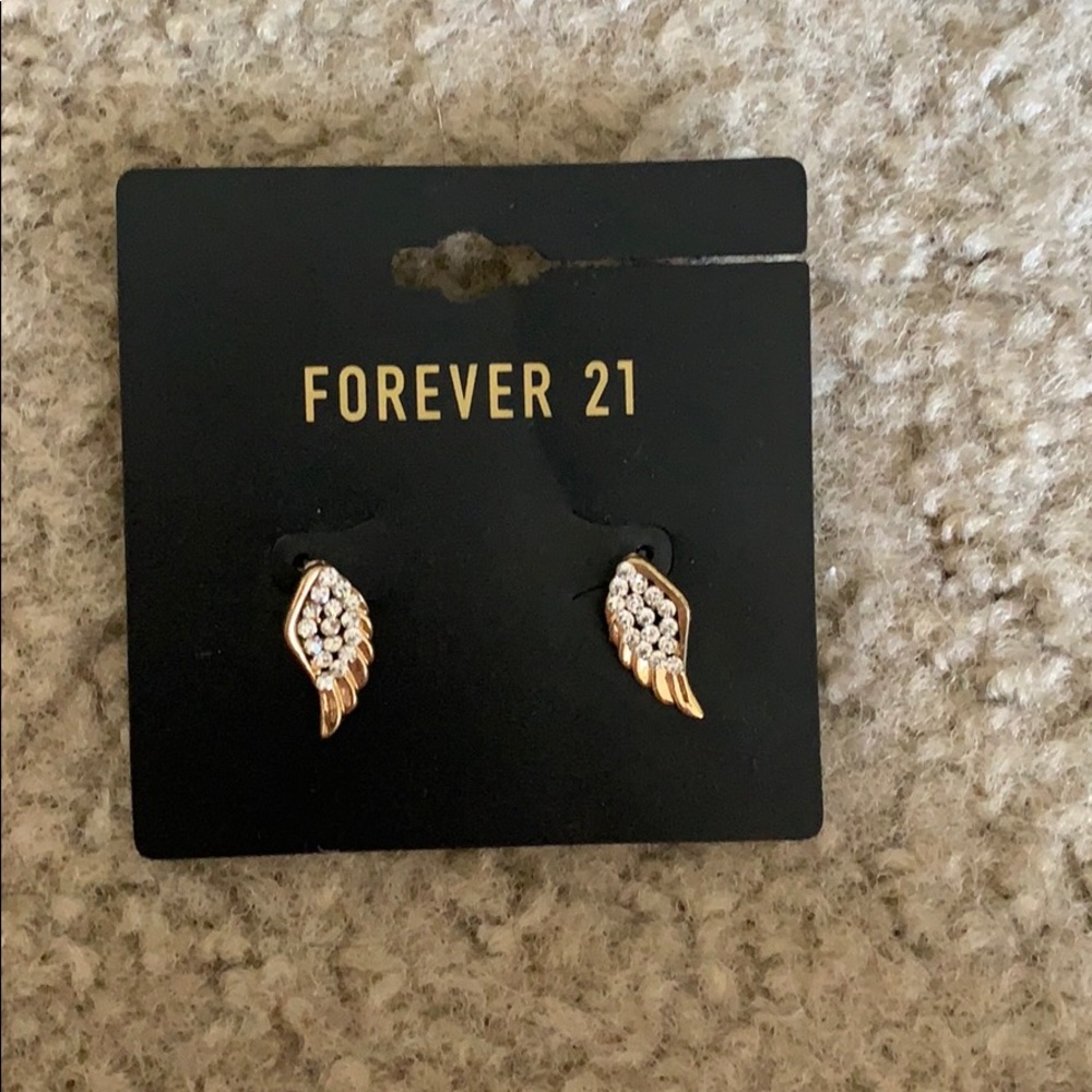 Never worn Forever 21 angel wing earrings